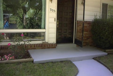 Turbo Wet Look Concrete Sealer Spray delivers high gloss finish on concrete porch at residential entrance.