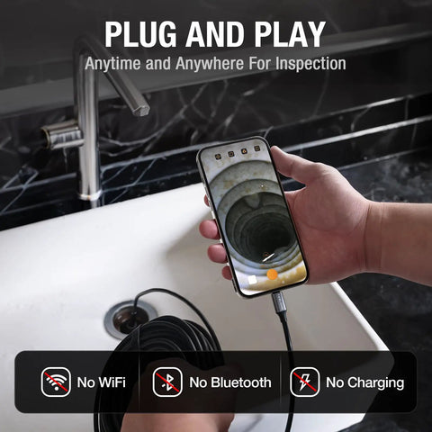User holding a phone with 50 Foot USB C Borescope Camera With Built In Light in a sink, showing real-time plumbing view.