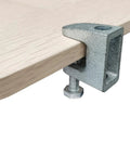 Three Eighths Inch Metal Beam C Clamp for wall ceiling flange mounts attached to wooden surface, showing galvanized finish.