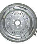 Direct Fit Clutch Flywheel For 2009 To 2010 Volkswagen Jetta L4 2.0L showing metallic surface and bolt holes, ready for installation.