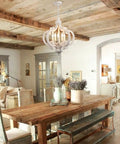White French Country Five Light Chandelier With Antique Distressed Wood Cozy Farmhouse Rustic Pendant Light in dining room setting.