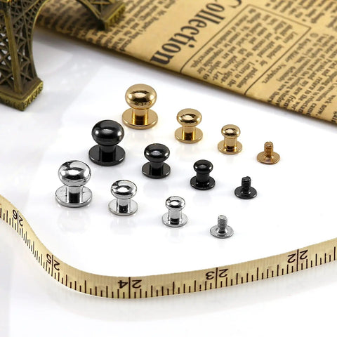 Badass Chicago Screws And Button Head Stud Rivets Sweet Top Tier Fasteners For Leathercraft Diy Crafts Featuring 50 Black Zinc Alloy Pieces, showcasing various sizes and finishes on a measuring tape.