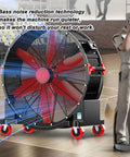 Heavy Duty Portable Floor Fan With Mega Reach Airflow And Easy Grip Handle Thirty Four Inch Sweep Three Adjustable Speeds in use.