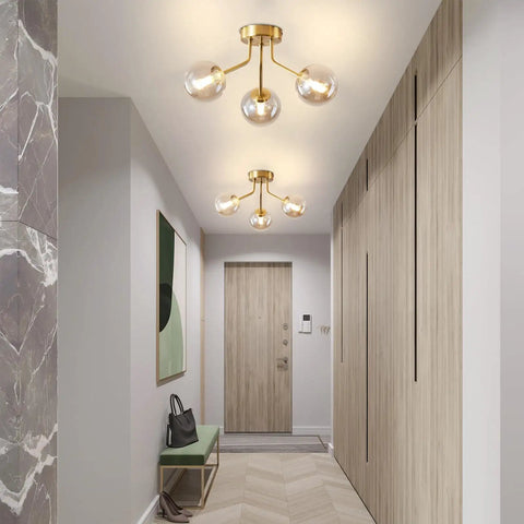 Three Light Sputnik Chandelier In Bold Gold Finish Semi Flush Mount Ceiling Light Fixture With Glass Globe in hallway