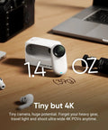 Tiny 4K Vlogging Cam With 128 GB White, Hands Free POV on desk with tech accessories, 1.4 oz lightweight design