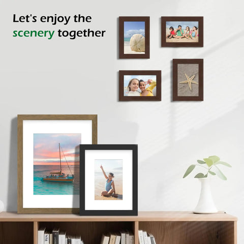 Two Pack Black Wooden Picture Frames For 16x20 To 11x14 Mat Opening 10.5x13.5 With Tempered Glass And Modern Matte Finish on a shelf