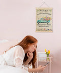 Flower Market Wall Art Decor Framed Canvas Print With Vintage Floral Pickup Truck 12x16 Inch hanging in a bedroom above a bed