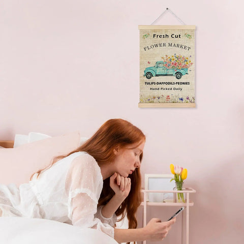 Flower Market Wall Art Decor Framed Canvas Print With Vintage Floral Pickup Truck 12x16 Inch hanging in a bedroom above a bed