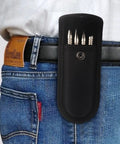 Heavy Duty Spring Nail Set With Heat Treated Steel And Accurate Size Marked Punches That Make Setting Fasteners A Breeze And Removing Hinge Pins A Total Cinch stored in a black pouch attached to a jeans pocket.