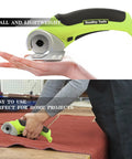 Cordless Electric Box Cutter Rechargeable Scissors in hand cutting carpet, compact design for easy use.