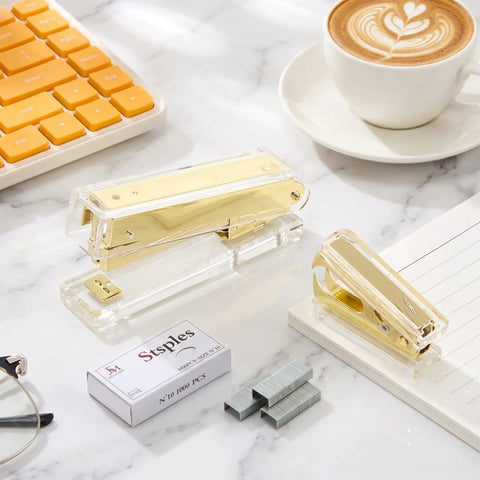Gold Desk Stapler Set With Acrylic Finish, 20 Sheet Capacity, Includes Staple Remover And 1000 26 By 6 Staples on marble desk