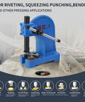 Beefy 1 Ton Manual Arbor Press For Riveting And Precision Hole Punching On A Heavy Duty Cast Iron Desktop Base With Stable Four Hole Mount And A Five And A Half Inch Maximum Height blue in operation on a workbench
