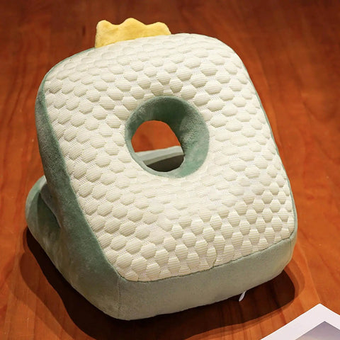 Green Cool Ice Silk Napping Face Pillow For Table Naps with ergonomic design on a wooden surface