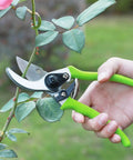 Limb And Branch Pruner Tool Set With Heat Treated Steel 15 Inch Lopper And 8 Inch Pruner cutting rose branch with green handles