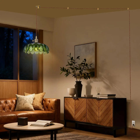 Kick Up Any Room Vintage Green Flower Glass Pendant Light With Long Plug In Cord For Kitchen Island And Bedroom Swinging Gold Tone Ceiling Lamp Fixture Adding Sweet Retro Vibes As A True Living Room Showpiece hanging above a brown leather couch.