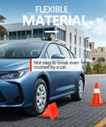 Car driving over 12 Pack 18 Inch Traffic Safety Cones With Reflective Collars, Durable PVC Construction, demonstrating flexibility.