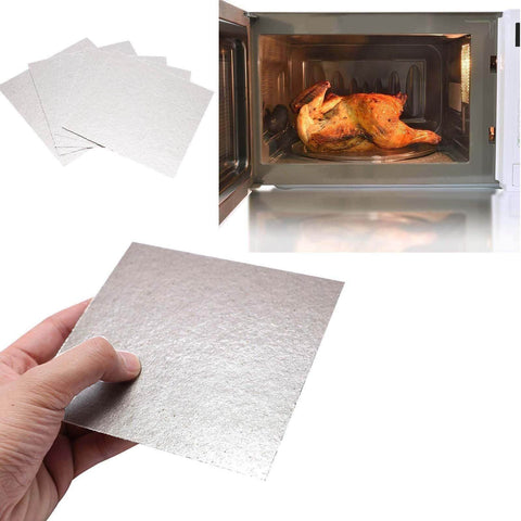 Hand holding Phlogopite Mica Sheet 100x100mm And 100x250mm 0.5 Thick Heavy Duty High Temp Heat Resistant Board near oven