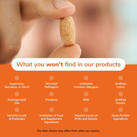 Close-up of hand holding a supplement capsule with text listing ingredients not in product, promoting purity and safety.