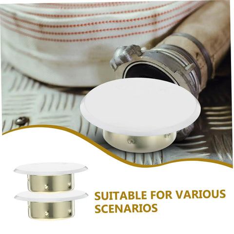 Four Pack Heavy Duty Metal Fire Sprinkler Nozzle Cover Plates on textured surface with fire hose in background, decorative design.