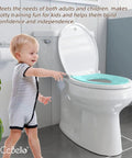 Child using All In One Potty Training Toilet Seat With Built In Toddler Seat Slow Close Magnetic Hinge Fits Adults And Kids in bathroom.