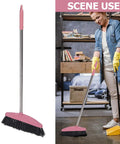 Long Handle Broom With Dense Stiff Bristles Heavy Duty Floor Sweeper built for yards, used for quick cleaning in a living space.