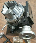 Precision Tilting Rotary Table With Three Jaw Chuck And Six Inch Centering Adapter offers a heavy duty metal construction for milling setups.