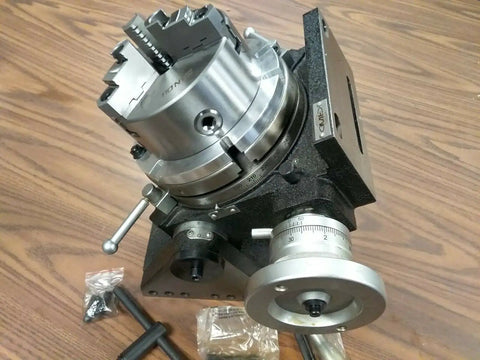 Precision Tilting Rotary Table With Three Jaw Chuck And Six Inch Centering Adapter offers a heavy duty metal construction for milling setups.