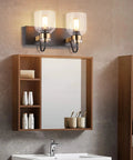 Two Light Bathroom Vanity Lighting Fixture Black And Brushed Gold Farmhouse Style Over Mirror Wall Sconces With Bubble Glass Globes Oil Brushed Bronze Accent Easy Install Durable shown above a bathroom mirror