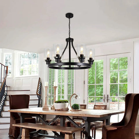 Six Light Farmhouse Wagon Wheel Chandelier Pendant Light Fixture In Matte Black in dining room setting