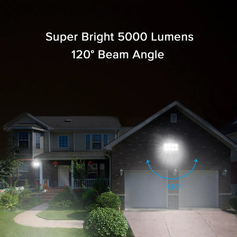Rugged Outdoor LED Flood Light 350W Equivalent 5000 Lumen illuminating garage exterior with 120° beam angle at night