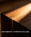 Close-up of a wooden corner showcasing natural wood finish, illustrating light reflection, Natural Wood Polish And Scratch Repair Balm No Sweat Quick Fix Furniture Wax Erases Water Rings Boosts Brightness Prevents Cracks Brush On Ready For Tables And Quality Woodwork Slick Professional Care.