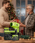 Cordless Leaf Blower Handheld Portable Dust Cleaner With Adjustable Speed And 180000 RPM, green box on table with two people