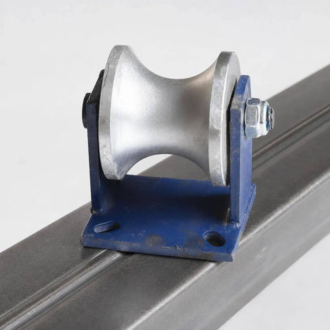 Smooth Operator V Shaped Gate Track Roller With Rock Solid 130X130mm Mounting Base on a steel guide for heavy duty sliding.