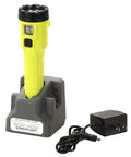 Dualie 275 Lumen Intrinsically Safe Rechargeable Flashlight with 120V 100V AC Charger on charging stand, yellow body.