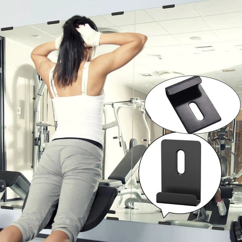Woman exercising with gym mirror secured by No Slip Glass Mounting Kit For Bathroom Walls Heavy Duty Glass Clamps