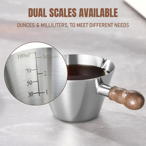 2 Piece Espresso Cup Set With Handle For Barista Level Pouring, 3.4 Oz Stainless Steel Cups With Dual V Shaped Spouts, silver with wooden handle, showing dual scales for precise, drip free pouring.