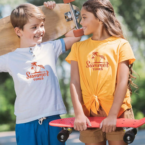 Kids in summer-themed T-shirts holding skateboards, showcasing Light T Shirt Heat Transfer Paper Pack 10 Sheets 8.5x11 Printable HTV.