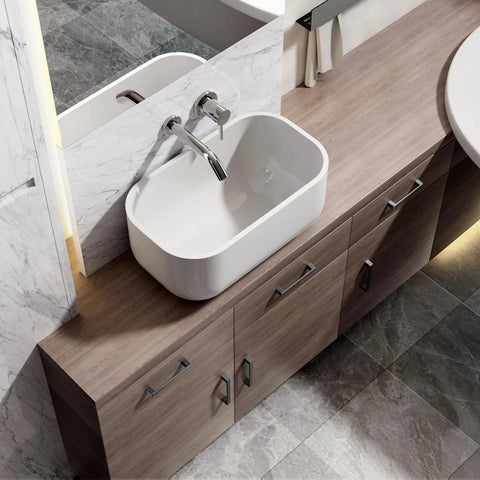 Bathroom vanity with 30 Pack 5 Inch Square Matte Black Cabinet Handles For Cabinets Drawers And Dressers, installed on wooden drawers under a white sink.