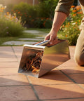 Stainless Steel Dustpan And Grain Scooper With Rugged Ergonomic Handle For Debris Cleanup In Workshops Warehouses Farms And Home Use Heavy Duty 201 Stainless Steel Construction For Quick Efficient Cleanup, shown collecting leaves on patio