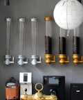 Wall Mounted Coffee Bean Dispenser With Large Capacity Clear Acrylic Storage Jar Premium Gold Finish, 5kg jars on display.
