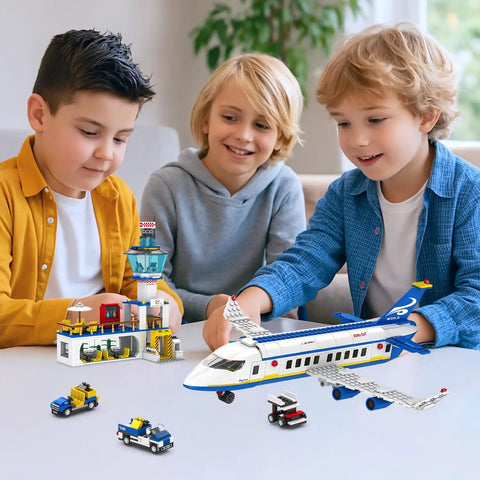 Children playing with Six In One City Airport Airplane Building Set With 886 Pieces For STEM Learning, includes airplane and terminal.