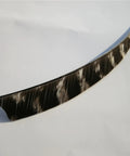 Close-up of a single black and white Shield Cut Turkey Feather Archery Fletches Pro Grade 3in for DIY hunting arrows.