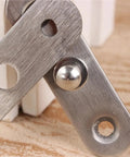 Close-up of a 1Pc Stainless Steel 360 Degree Rotating Door Pivot Hinge for Cabinets and Folding Kitchen Doors Hidden Rotary Hardware
