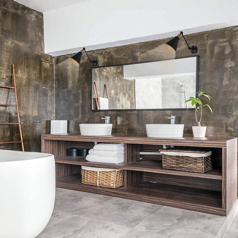 Modern bathroom with Vintage Industrial Wall Sconce Light Set of Two With Adjustable Swing Arm in Bronze Finish over mirror.