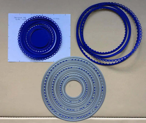 12pc Nesting Round Frame Die Cut Set for Cards and Scrapbooking with blue lace circle tag background dies and silver cutting dies.