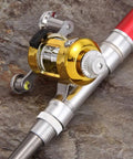 Close-up of Pocket Size Pen Fishing Pole And Reel Combo For Travel, featuring telescopic mini rod and rust resistant reel.