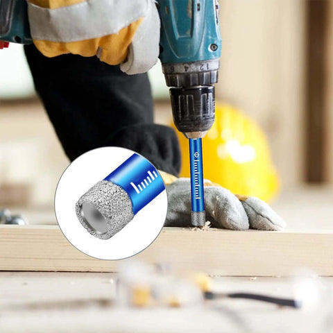 9-piece dry diamond drill bit set, blue, side view of drill bit in use for tile and stone, 6–12 mm.