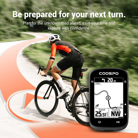 Cyclist using Wireless Bike Computer With 2.6 Inch LCD GPS Route Navigation, showing turn prompt on forest path.