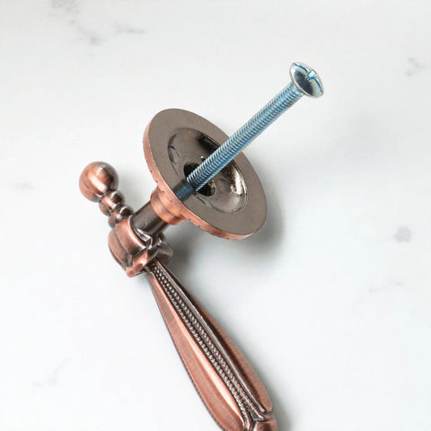 Five Pack Bronze Vintage Cabinet Handles With Antique Copper Finish showcasing detailed design and hardware attachment.