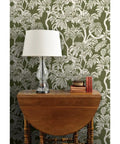 Top Notch Type II Professional Tropical Jungle Wallpaper Featuring Hella Durable Matte Finish and Subtle Linen Texture against a green background with a lamp and side table.